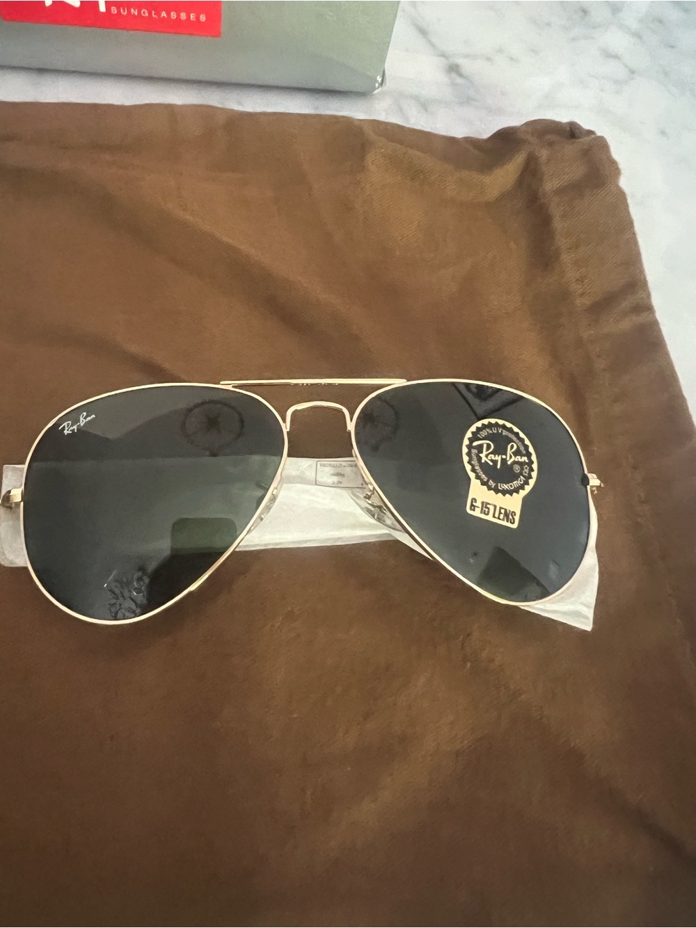 Ray-Ban Gold Aviator Sunglasses with Dark Green Lenses